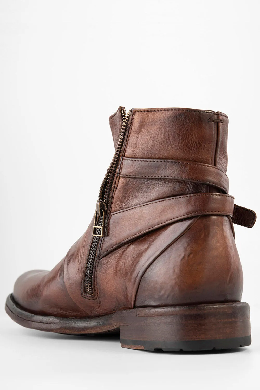 EYTON rich-brown laceless ankle boots.