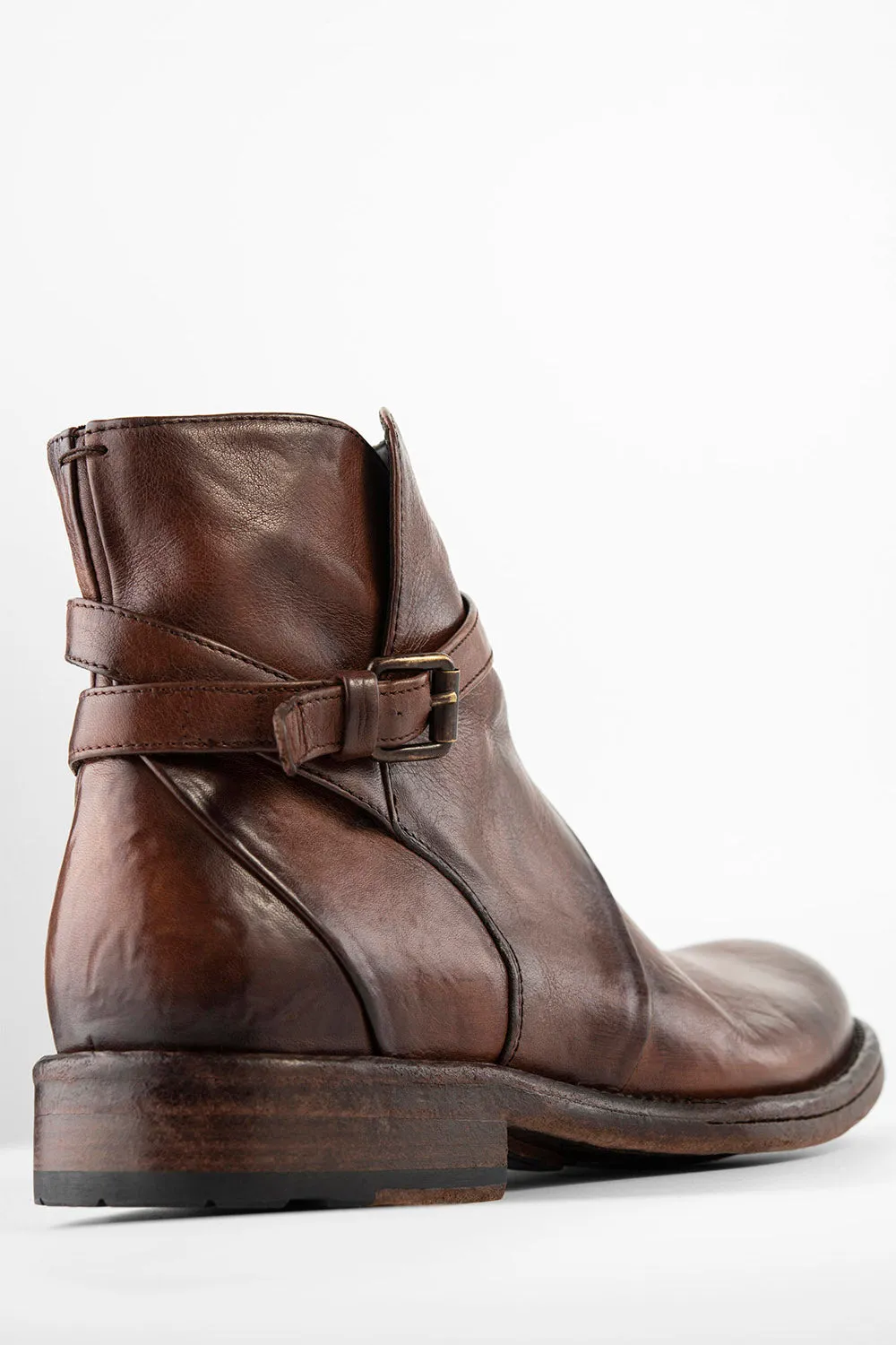 EYTON rich-brown laceless ankle boots.