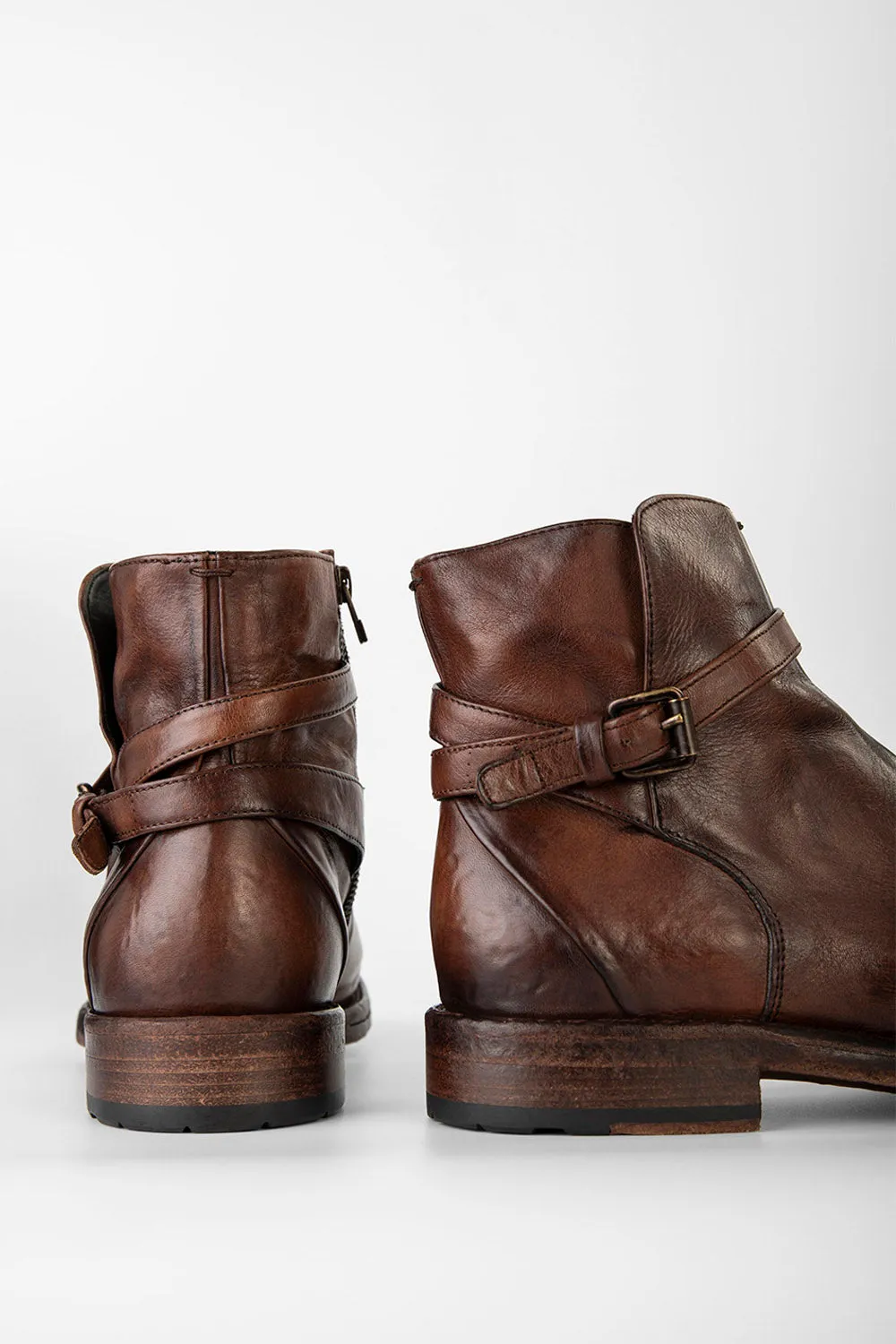 EYTON rich-brown laceless ankle boots.