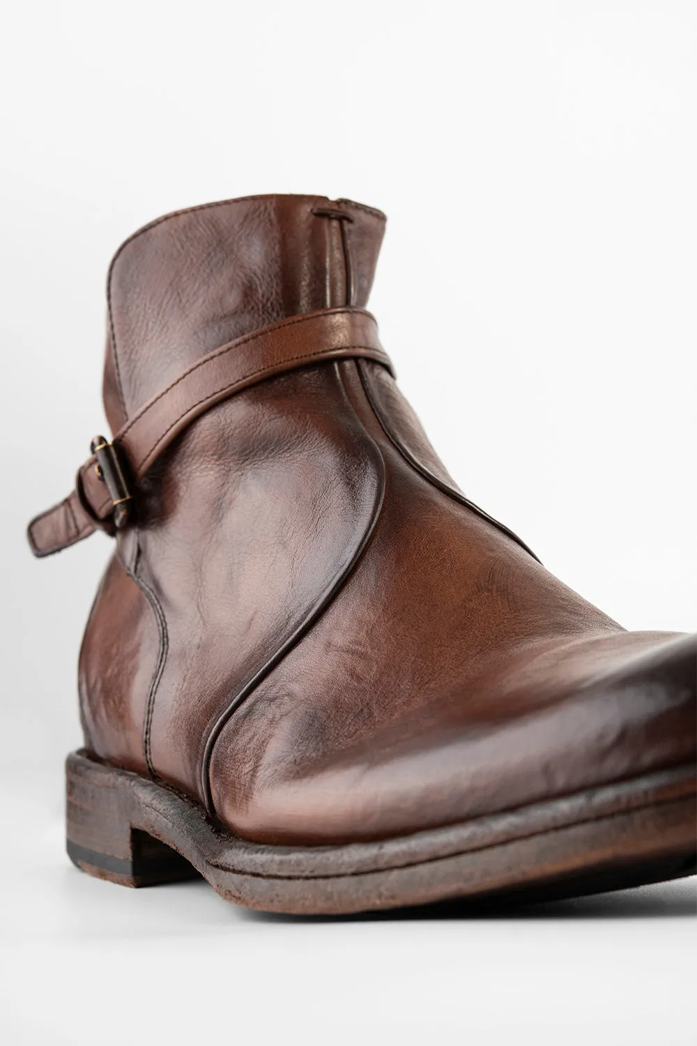 EYTON rich-brown laceless ankle boots.