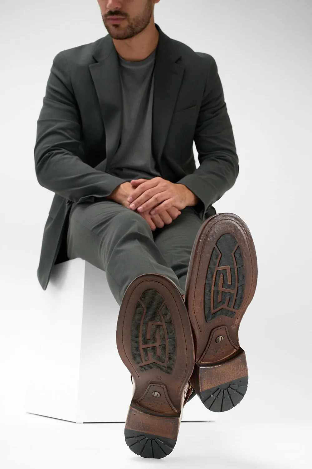 EYTON rich-brown laceless ankle boots.